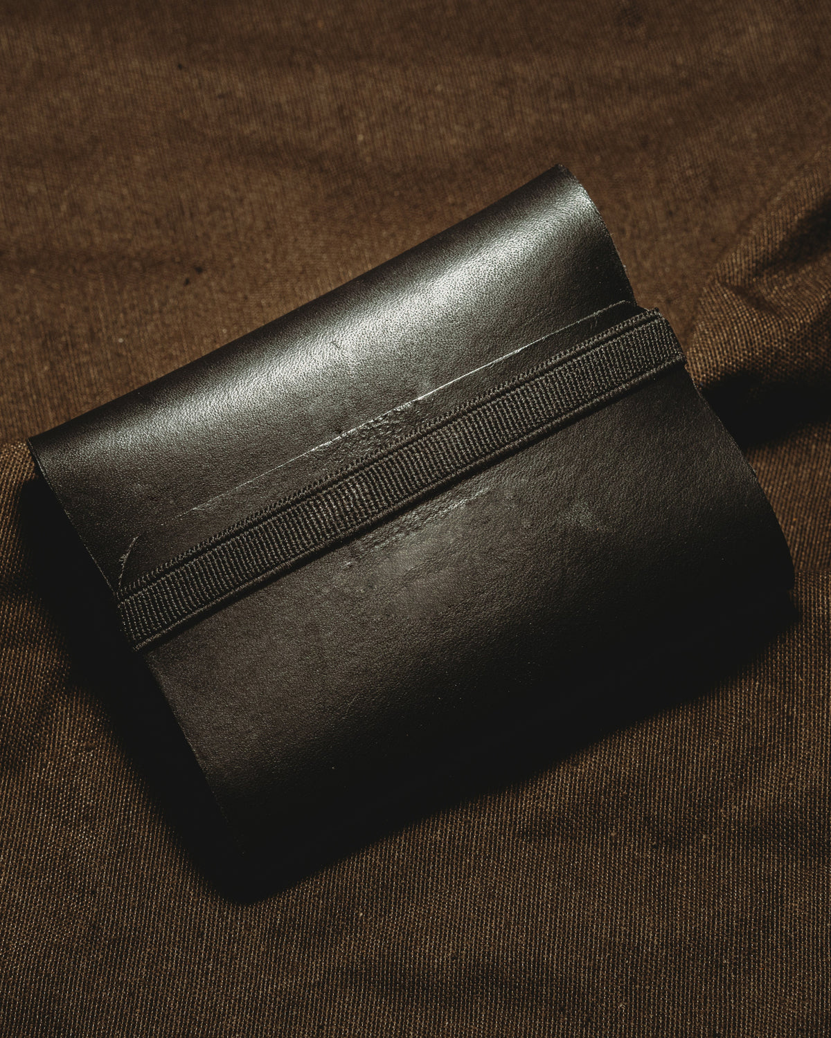 black leather Baziku pouch - front