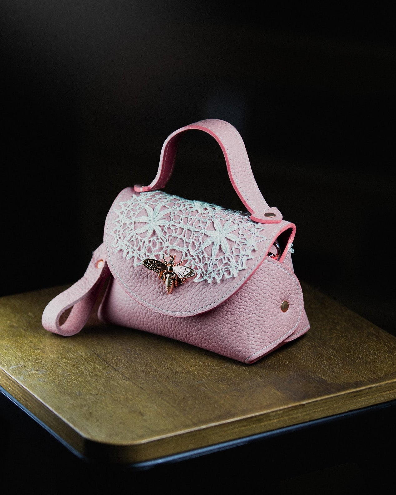 Pink micro handbag with lace detailing 