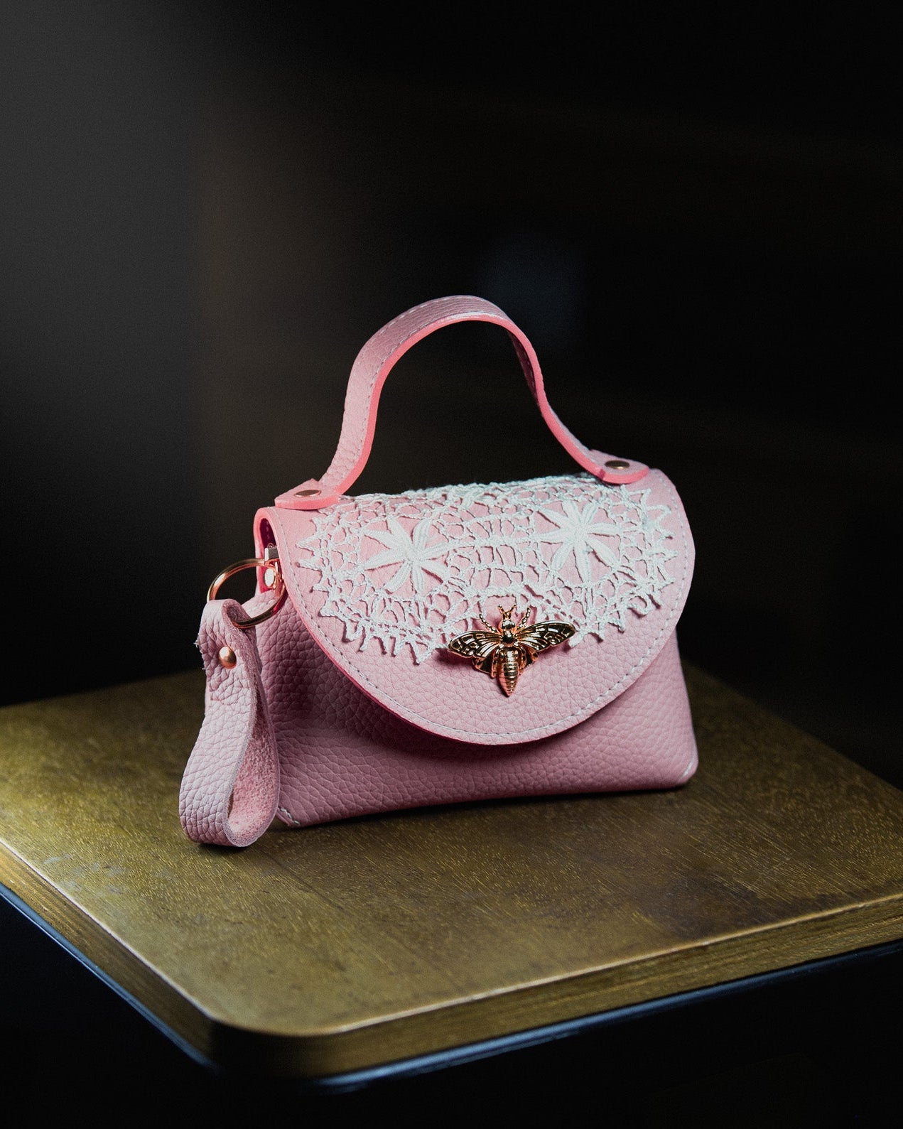 Pink micro handbag with lace detailing 