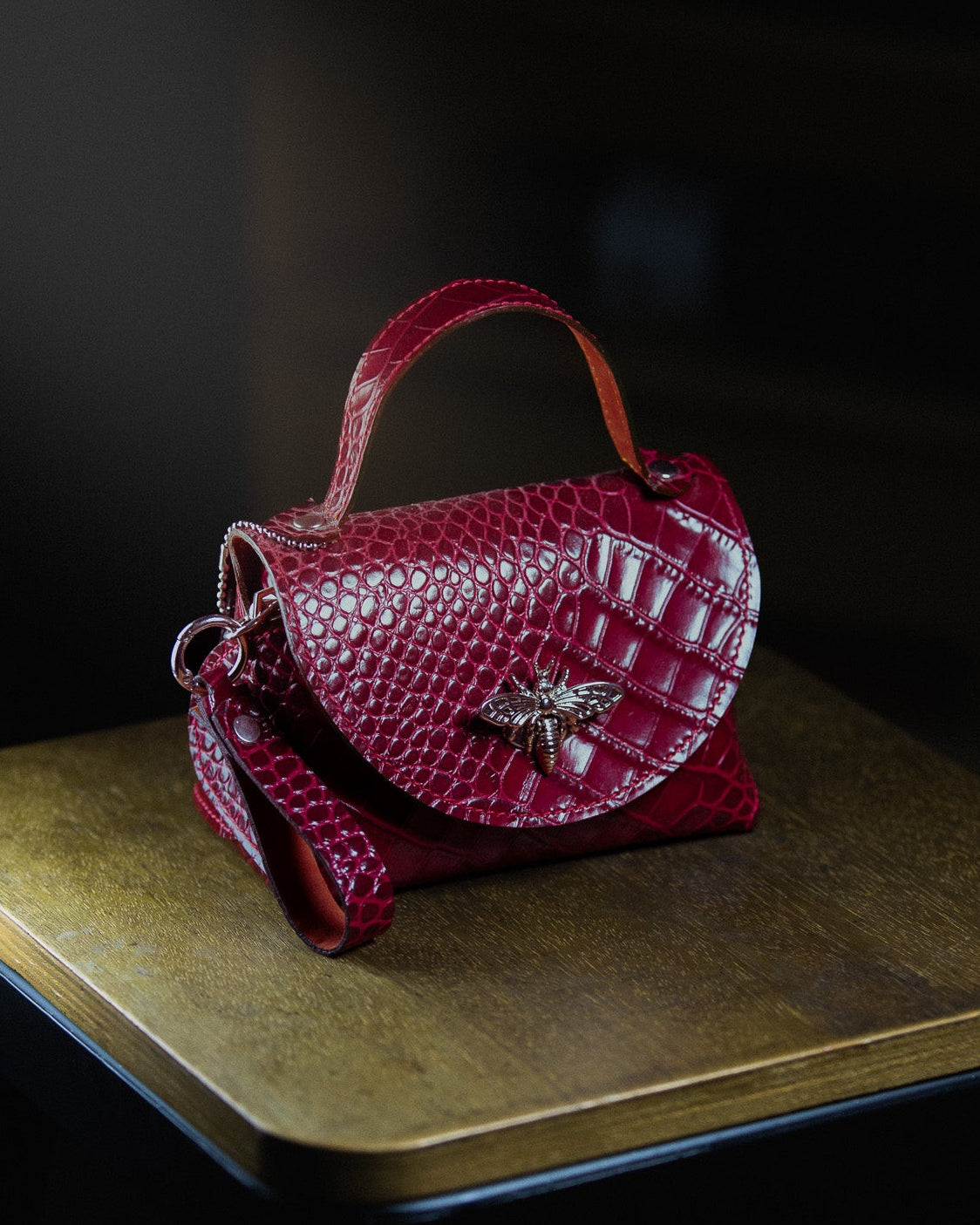 Red micro textured handbag 
