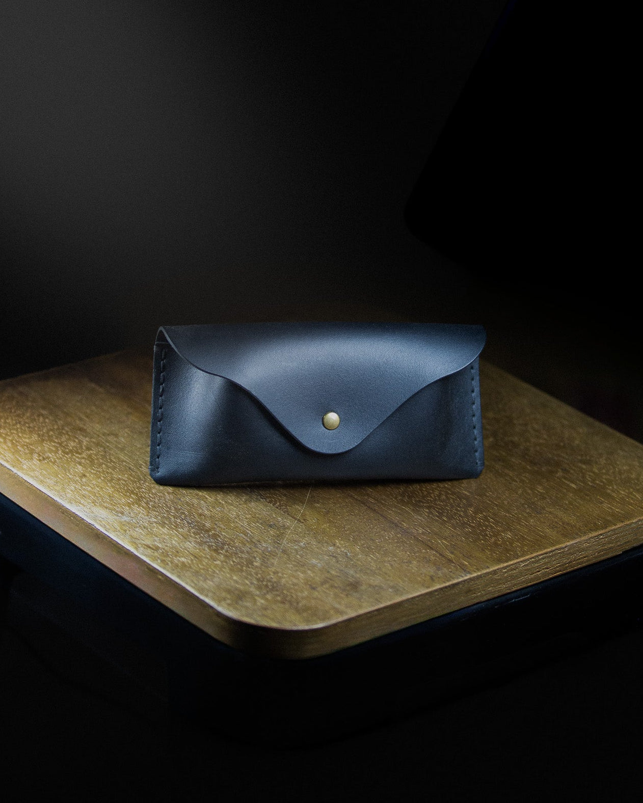 dark blue leather sunglasses pouch