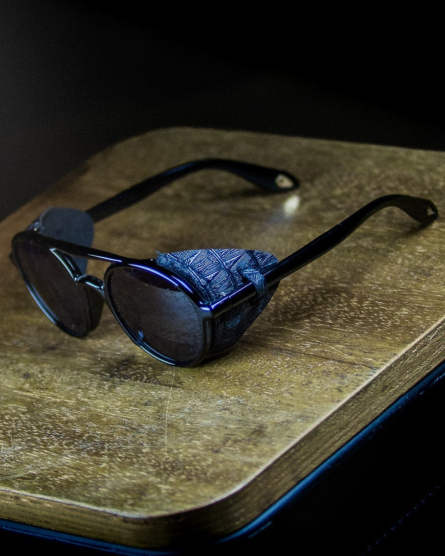 Sunglasses with black frame and dark lenses