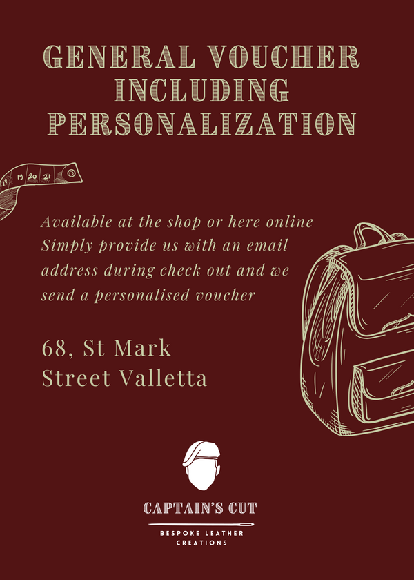 A gift voucher titled 'GENERAL Voucher Including Personalization' from Captain's Cut, showing an illustration of a leather-bound notebook and a suitcase, indicating a personalized touch. The address and logo of the brand are visible.