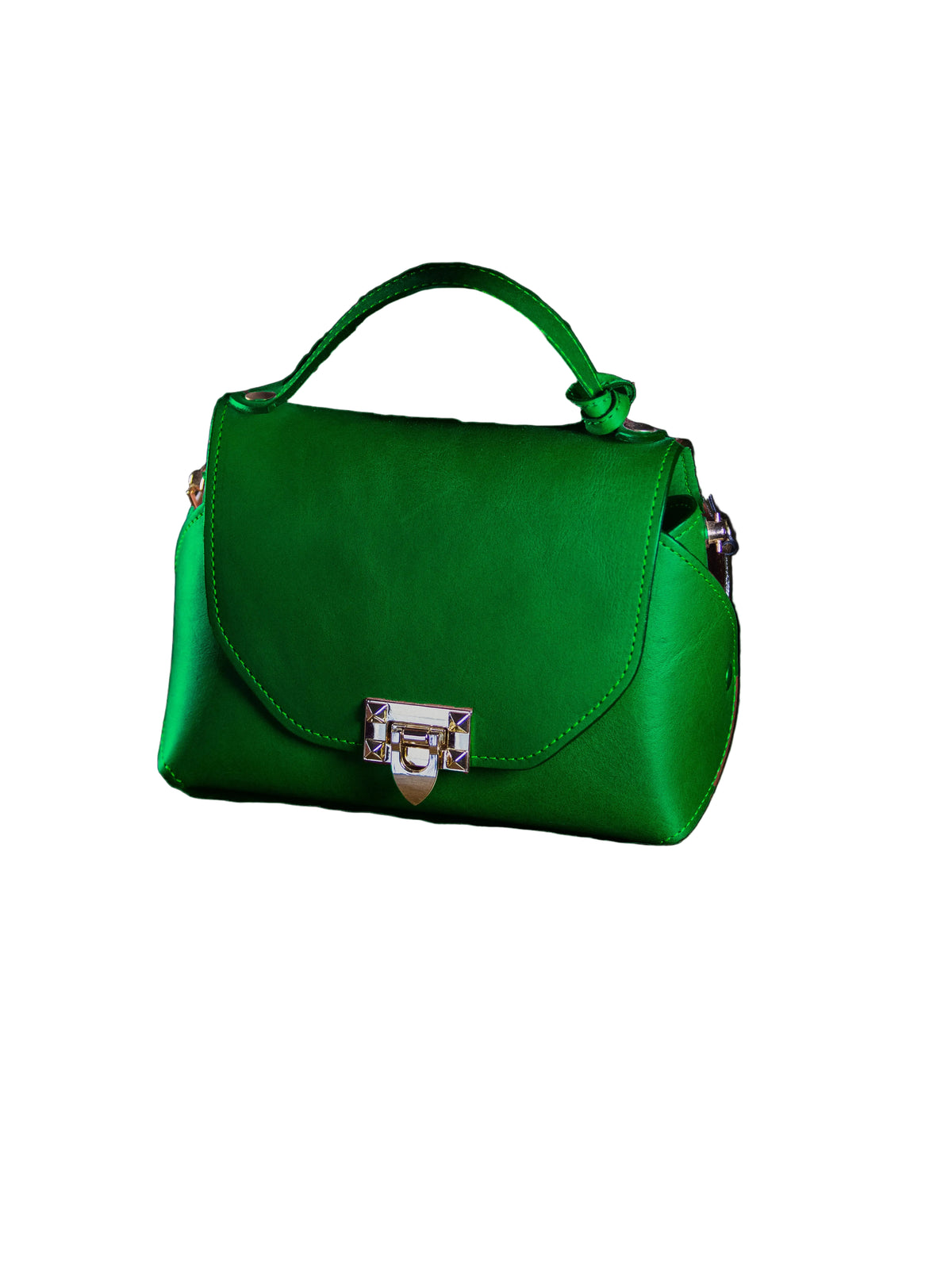 Green leather handbag with a silver lock on a dark surface